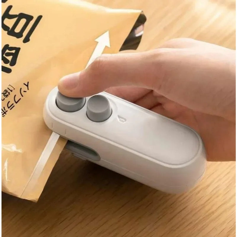 Mini Sellador de Bolsas Con Cortador Recarregable